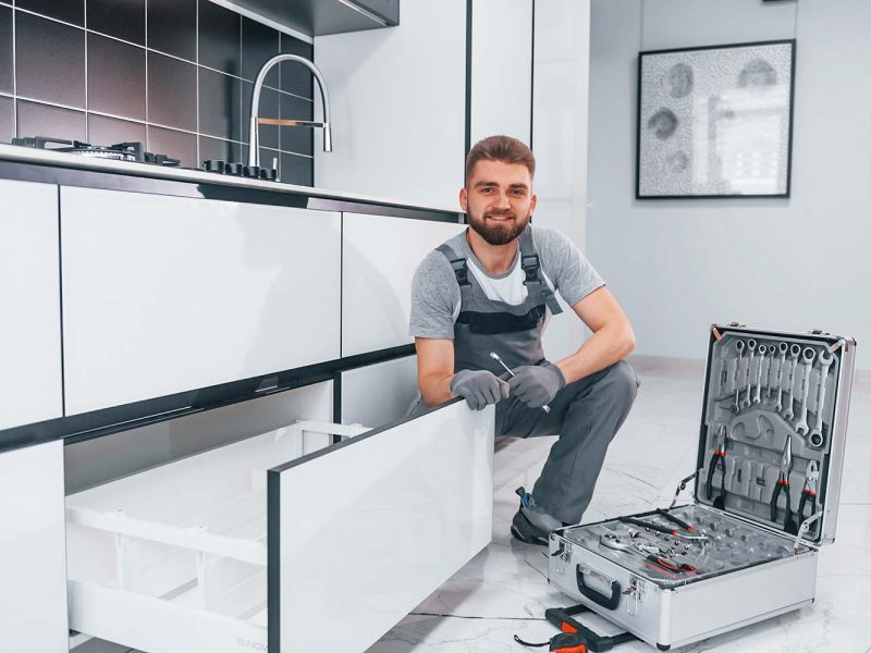 young-professional-plumber-in-grey-uniform-using-e-resize.jpg young-professional-plumber-in-grey-uniform-using-e-resize.jpg